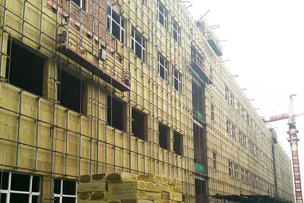 Stone wool insulation installed at a construction project site