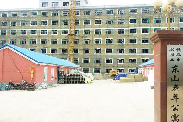 Stone wool insulation installed at a construction project site